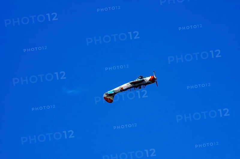 A Jakovlev Jak-52 with registration LY-HLZ during a flight demonstration as part of an air show on Rossfeld in Metzingen-Glems, Baden-Württemberg, Germany, for editorial use only