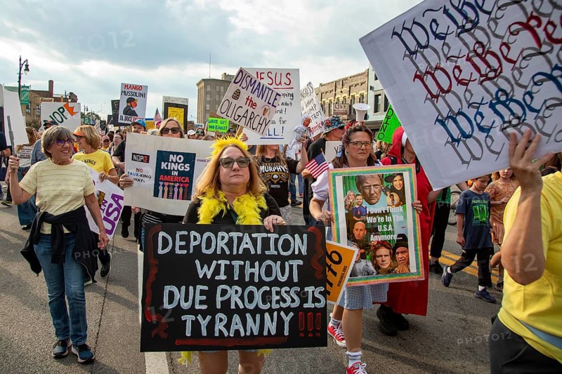 Detroit, Michigan USA - 18 October 2025 - A large crowd gathered for a 'No Kings' rally, protesting President Trump's actions against immigrants and against democratic institutions