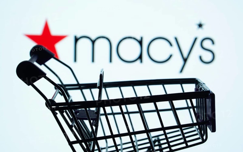 Dhaka, Bangladesh- 03 July 2025: Silhouette of a shopping cart in front of the Macy's logo, symbolizing ecommerce and online shopping