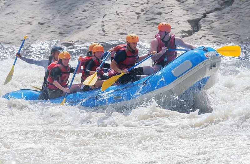 A group of people white water rafting, Costa Rica, Central America