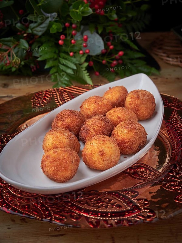Delicious golden croquettes plating on a christmas holiday table