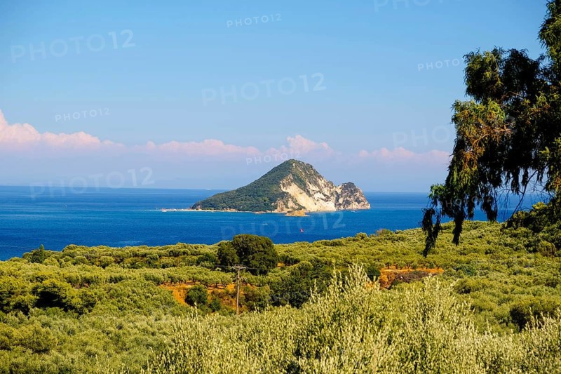 Marathonisi, affectionately known as Turtle Island, is a small, uninhabited islet in the Bay of Laganas, famed for its unique turtle-like shape