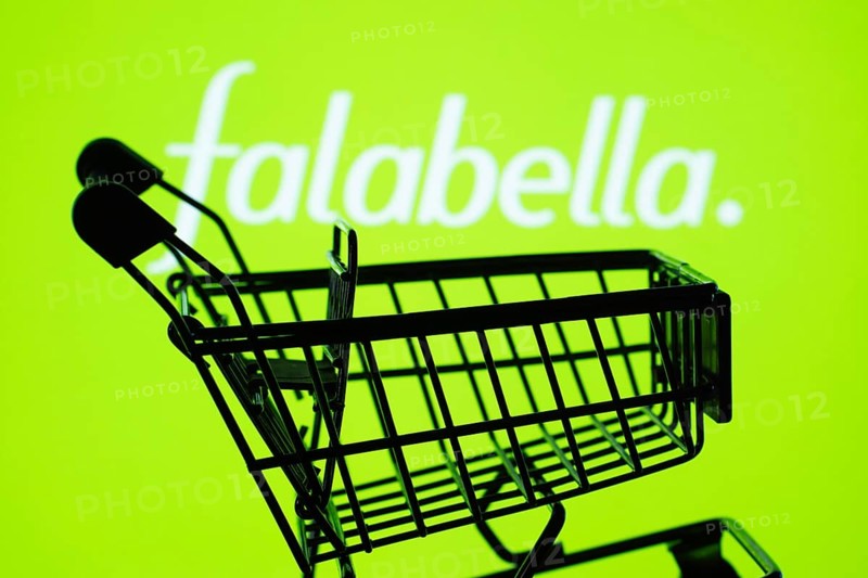 Dhaka, Bangladesh- 03 Oct 2025: Silhouette of a shopping cart in front of the Falabella. logo, symbolizing ecommerce and online shopping