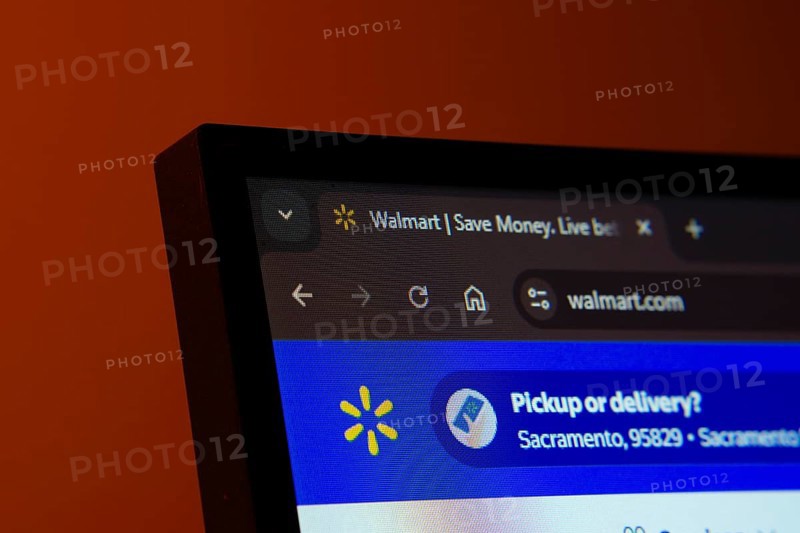 Dhaka, Bangladesh- 02 June 2025: Close-up of a computer screen displaying the Walmart web interface in dark mode