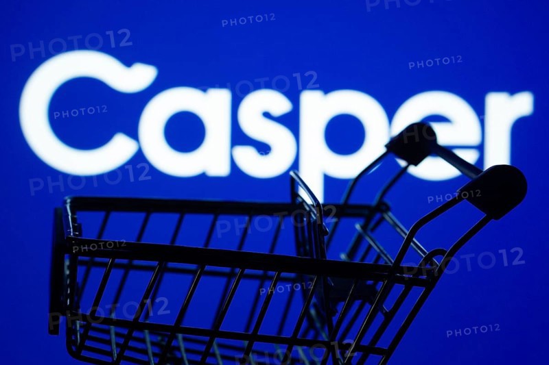 Dhaka, Bangladesh- 03 July 2025: Silhouette of a shopping cart in front of the Casper logo, symbolizing ecommerce and online shopping