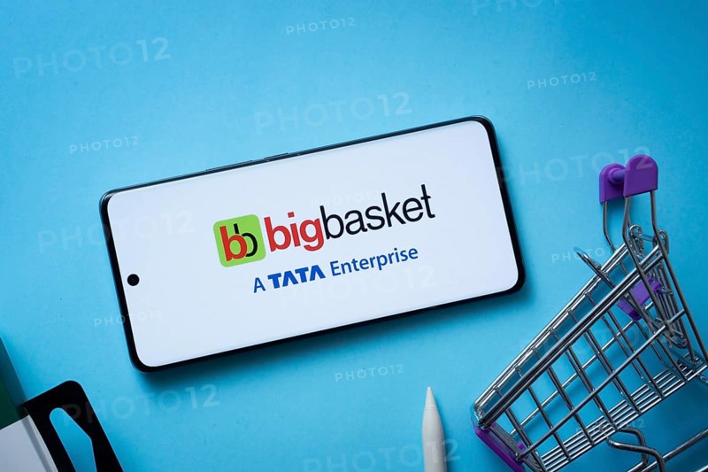 Dhaka, Bangladesh- 03 July 2025: Smartphone displaying BigBasket logo with shopping cart on a blue background