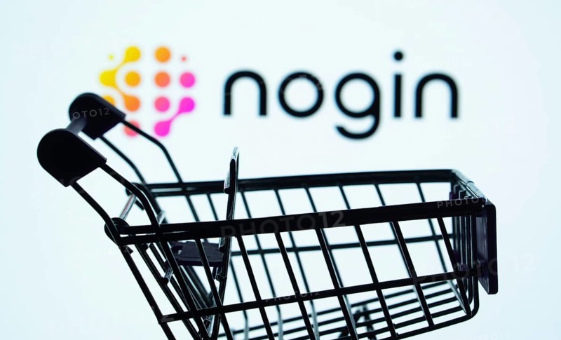 Dhaka, Bangladesh- 03 July 2025: Silhouette of a shopping cart in front of the nogin logo, symbolizing ecommerce and online shopping