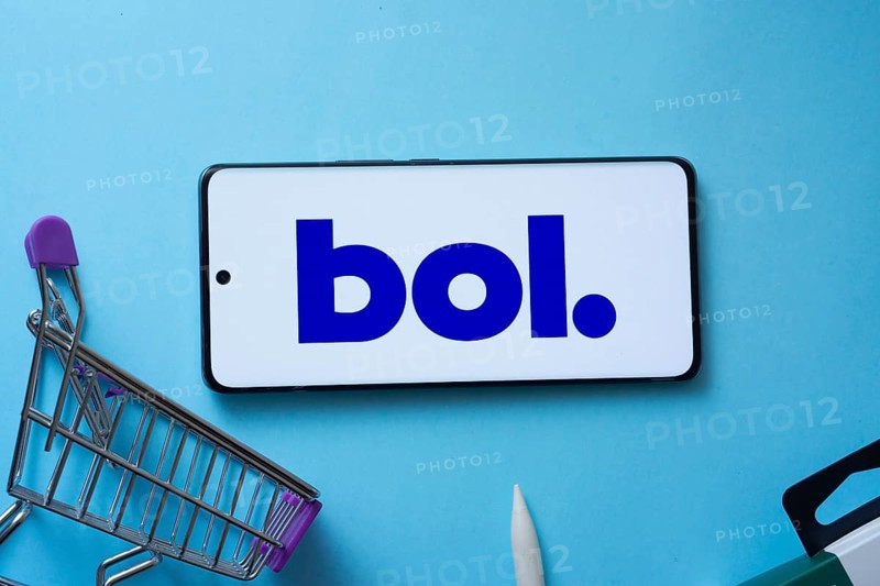 Dhaka, Bangladesh- 03 July 2025: Smartphone displaying bol logo with shopping cart on a blue background