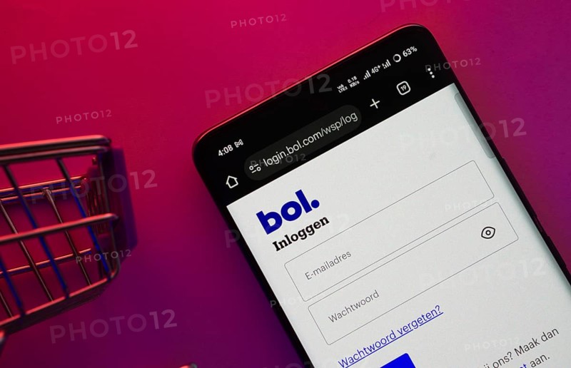 Dhaka, Bangladesh- 23 June 2025: A smartphone displaying the bol website with a shopping cart is shown on a vibrant background