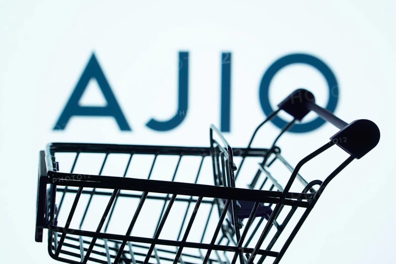 Dhaka, Bangladesh- 03 July 2025: Silhouette of a shopping cart in front of the AJIO logo, symbolizing ecommerce and online shopping