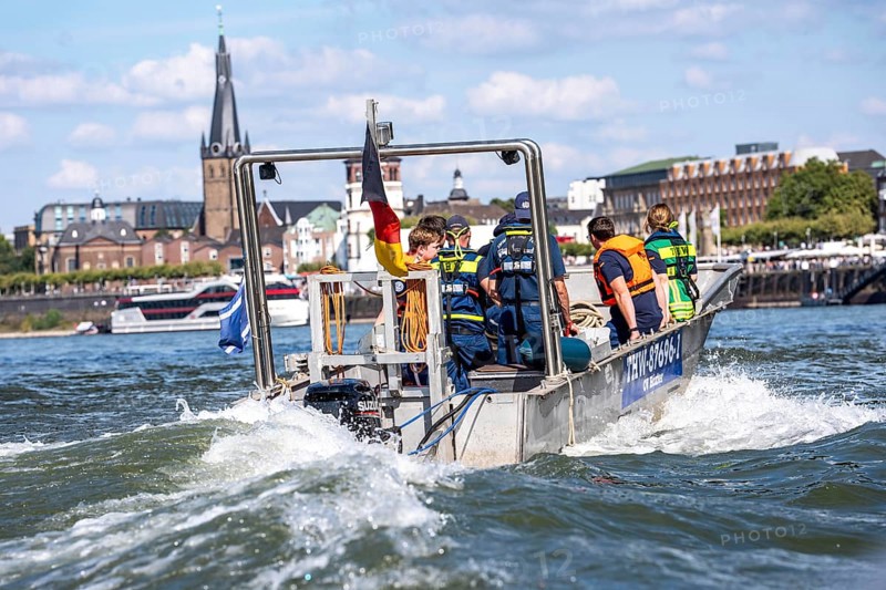 Multi-purpose boat of the THW during a training trip on the Rhine near Düsseldorf, the specialist group for water hazards, this type of boat is used to transport people and goods as a rescue boat and as a working platform, during the major exercise FÜLEX25, lasting several days, of the THW, Technical Relief Organisation, North Rhine-Westphalia regional association, over 3500 volunteers from the 127 North Rhine-Westphalia local associations practise many different deployment scenarios over 4 weekends