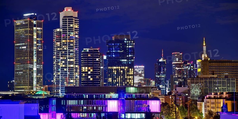 Rooftop day with colourfully illuminated houses for a techno party on the roof with a view of the skyline, Frankfurt am Main, Hesse, Germany