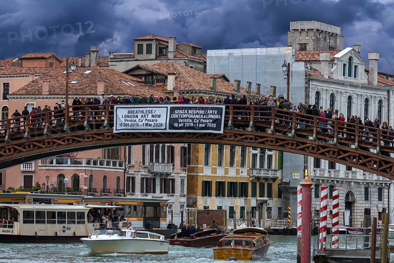 Crowds of tourists on the Ponte dell'Accademia in high season, Venice, Veneto, Italy