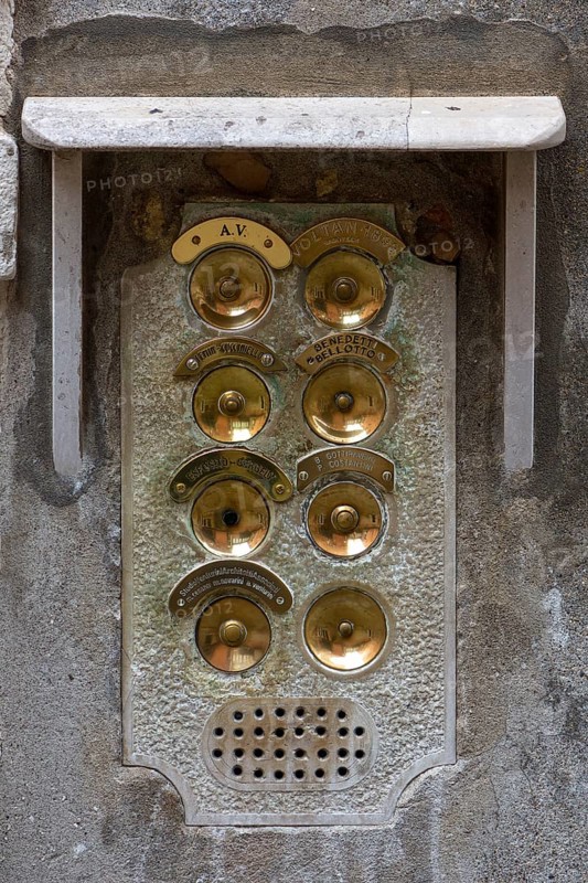 Brass bells on a residential building, Venice, Veneto, Italy
