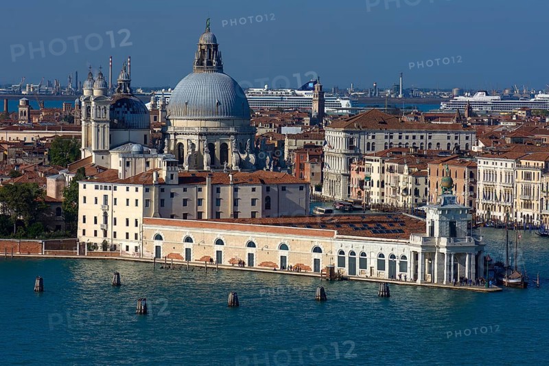 Santa Maria della Salute church, Museum of Modern Art in front, cruise ships anchored at the back, blue sky, Venice, Veneto, Italy