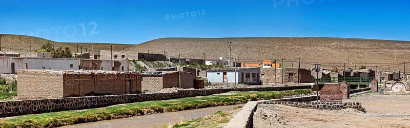 Overview of a small village in a dry and sunny hilly area, San Antonio de los Cobres, Salta Province, Argentina