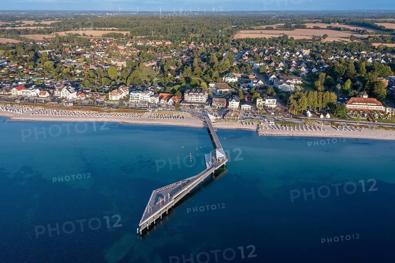 Aerial view over Seebrücke, pier and sandy beach at seaside resort Haffkrug along the Baltic Sea, Scharbeutz, Schleswig-Holstein, Germany