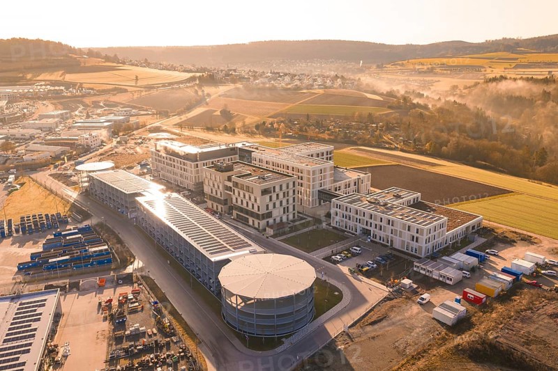Aerial view of a large industrial area in a hilly landscape, new hospital at the Calw health campus, Calw district, Germany
