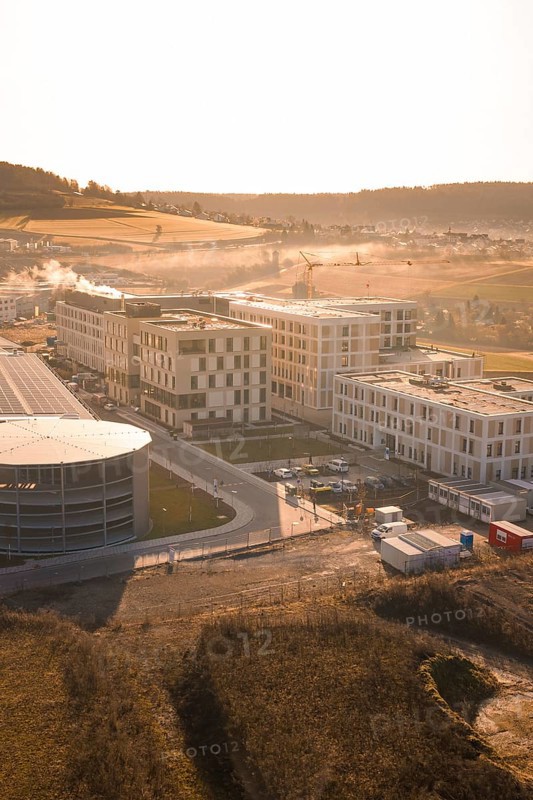 Modern architecture in rural surroundings with small fields and rolling hills, new hospital at the Calw health campus, Calw district, Germany