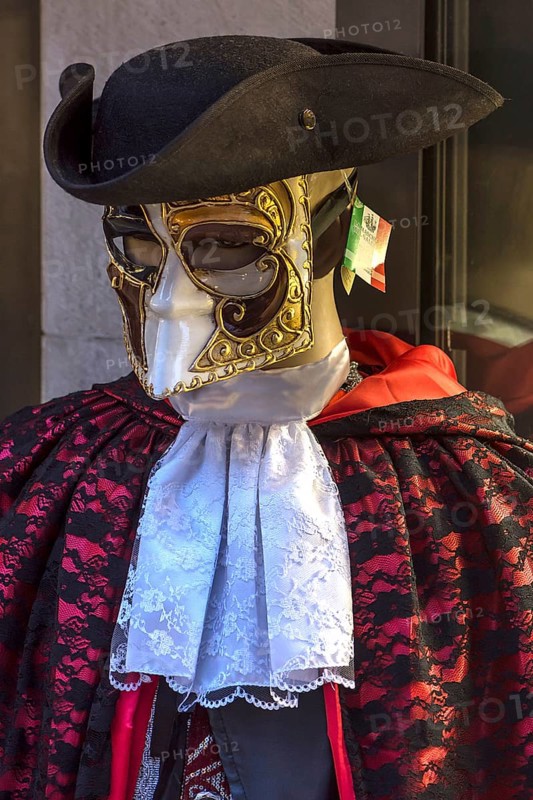 Venetian carnival costume in front of a shop, Venice, Veneto, Italy