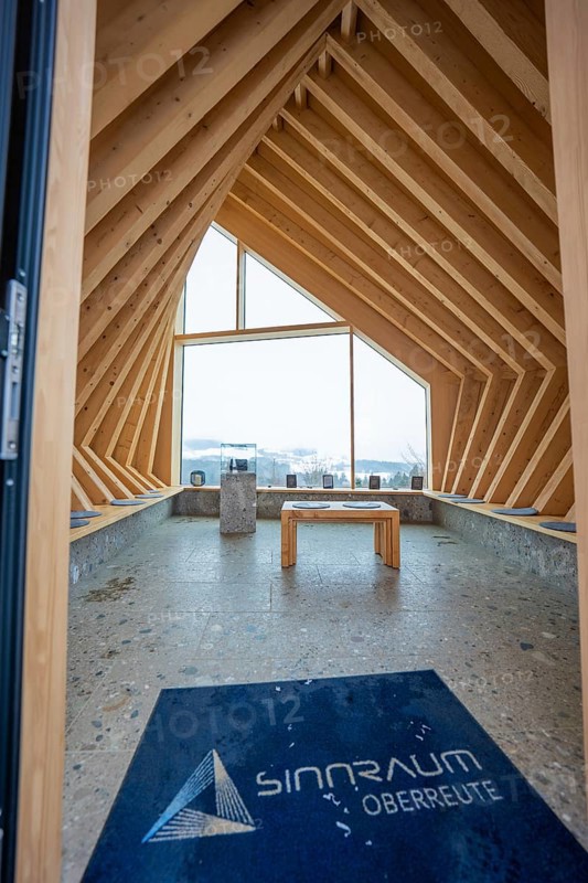 Modern interior with wooden elements and large window with views of nature, Sinnraum, Oberreute, Allgäu, Bavaria, Germany