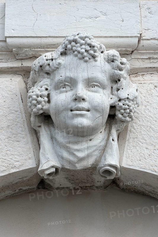 Head of a Bacchus above a gate, Venice, Veneto, Italy