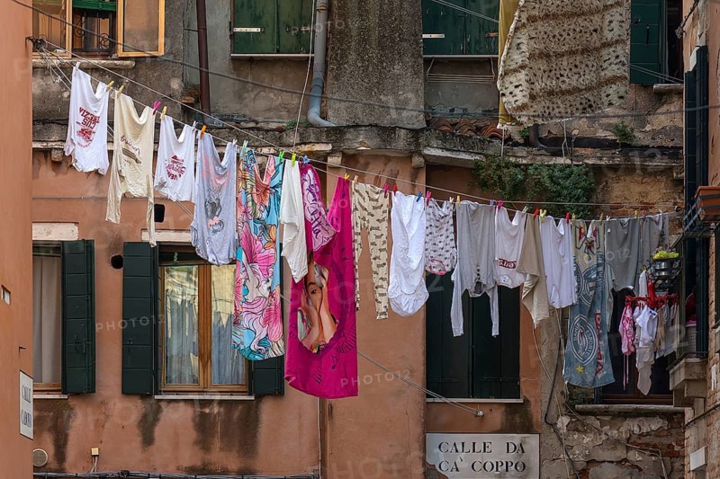 Laundry hung up for tourists in the Castello district, Venice, Veneto, Italy