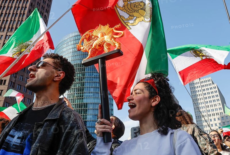 Iranians demonstrate on the day of the US and Israeli attack on Iran in Berlin, 28.02.2026. People cheer the rumor that Obermullah Khamenei died in the attack, Berlin, Berlin, Germany