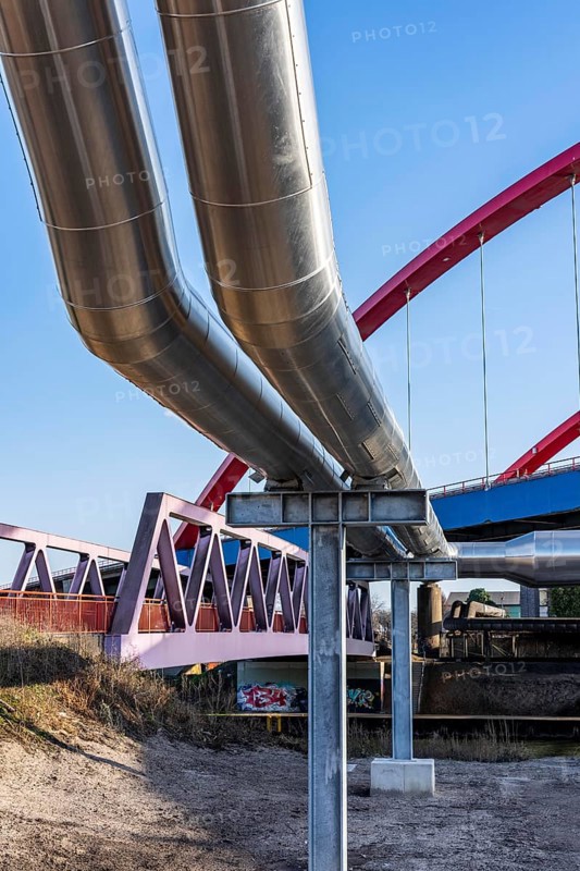 Iqony district heating pipes at the city port, crosses the Rhine-Herne Canal in Essen, A42 motorway bridge, North Rhine-Westphalia, Germany