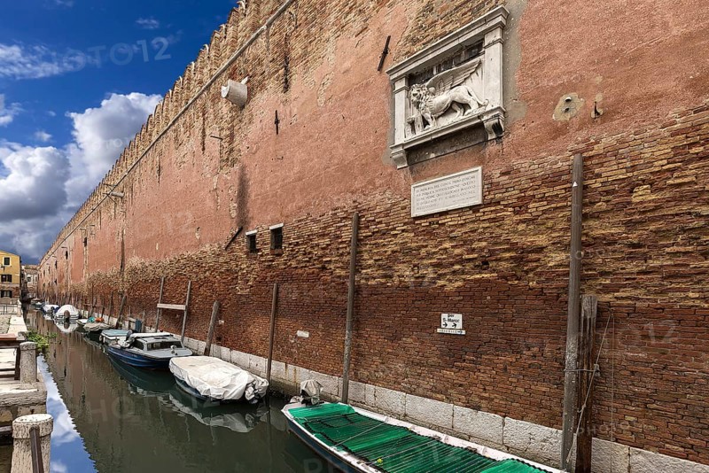 Historic wall from the Arsenal, relief with the heraldic animal of the Venetian lion, Venice, Veneto, Italy