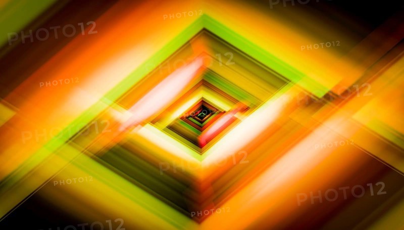 This digital artwork features a 3D render of a geometric tunnel with vibrant, blurred colors that create a dynamic sense of movement and depth