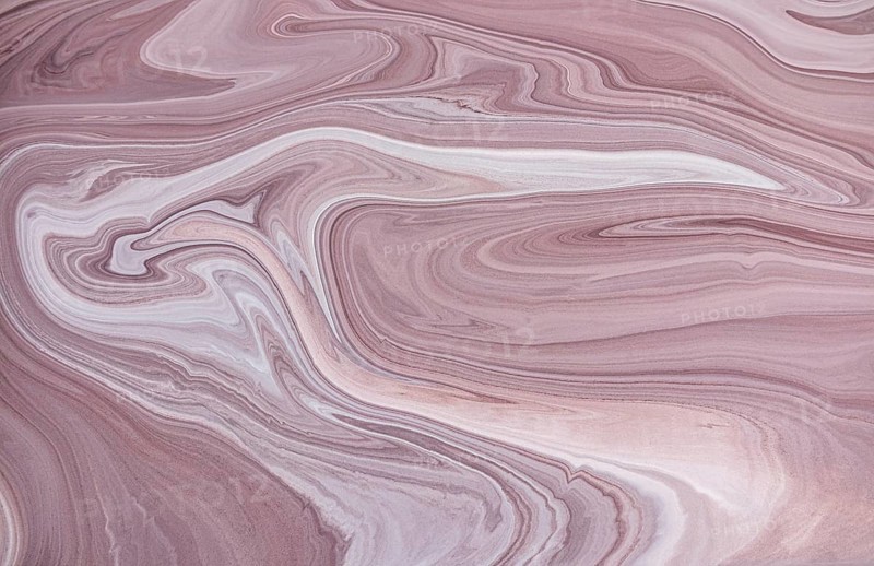 A captivating view of pink and white acrylic paint marble pattern, featuring intricate swirls and organic lines. Perfect for backgrounds or decorative projects, offering elegance and natural beauty