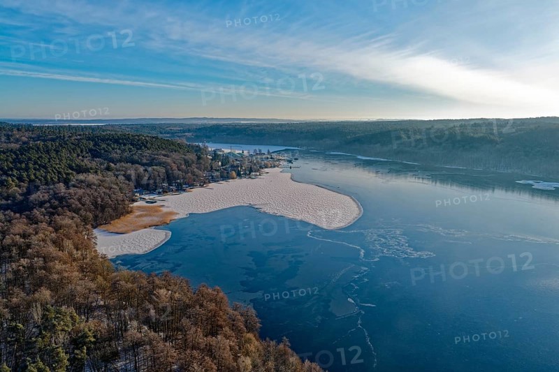 Lake Werbellin in the UNESCO Schorfheide-Chorin Biosphere Reserve with ice rinks in winter. aerial view. Joachimsthal, Schorfheide, Brandenburg, Germany