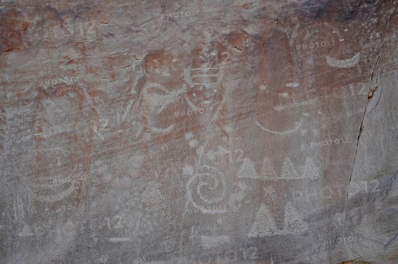Ancient petroglyphs from the Fremont culture on a rock with mystical signs and symbols, Dinosaur National Monument, Utah, USA