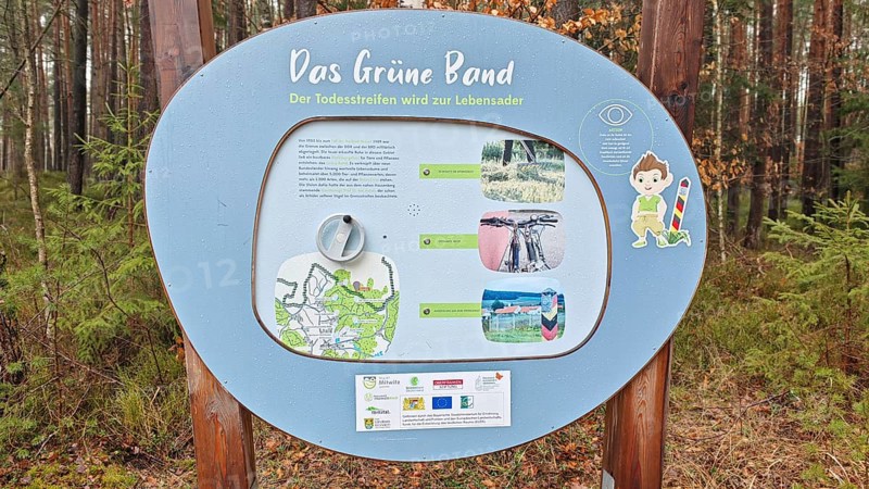 Information sign about the Green Belt in a wooded area, hiking on the former inner-German border on the Green Belt near Mitwitz, Frankenwald nature park Park