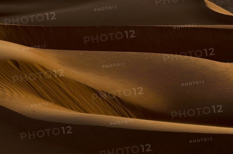 Shapes and shadows of Sand dunes in the desert of Oman near A'Sharqiyah Sands
