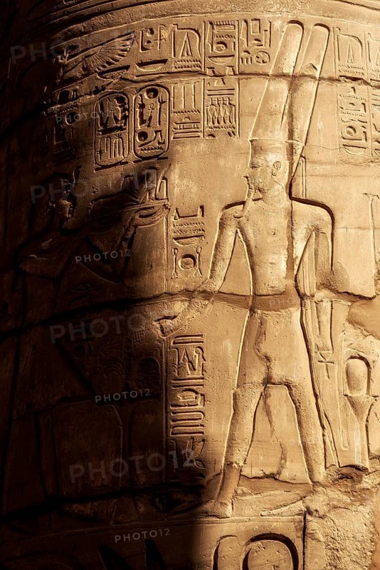 Ancient Egyptian Pharaoh Carved in Stone at Luxor Temple, Historical City of Thebes. Gods and Kings of Egyptology. Egypt