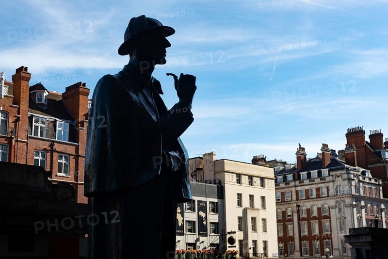 London, UK. July 9th 2022 Statue of Sherlock Holmes by sculptor John Doubleday stands near the supposed site of 221B Baker Street, near to the Sherlock Holmes Museum and Baker Street Underground Station, London