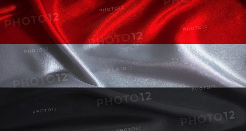 National flag of Yemen with cloth texture. Yemeni flag with realistic texture background