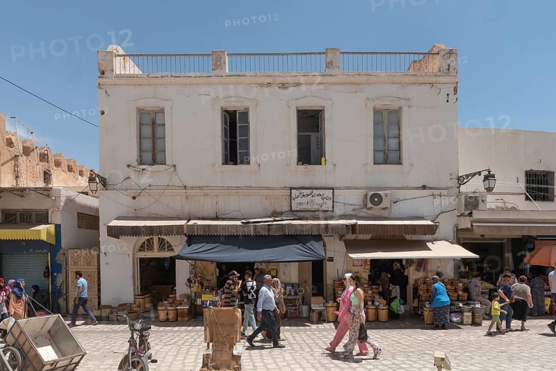 Tunisian shopping in the market of Sfax Medina, Tunisia, North Africa