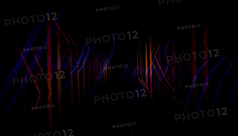 This 3D render captures a mesmerizing abstract tunnel formed by sharp intersecting lines of vibrant light in dark hues, capturing an ethereal sense of movement and depth suitable for creative backgrounds