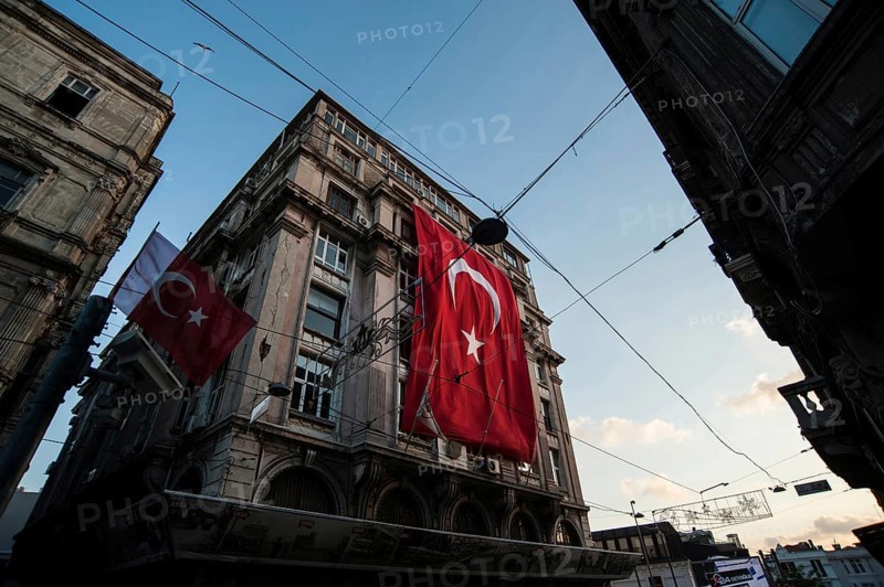 Istanbul, Turkey. July 2rd 2016 Turkish flag hanging from a European style building in the Beyoglu neighborhood of Istanbul, Turkey
