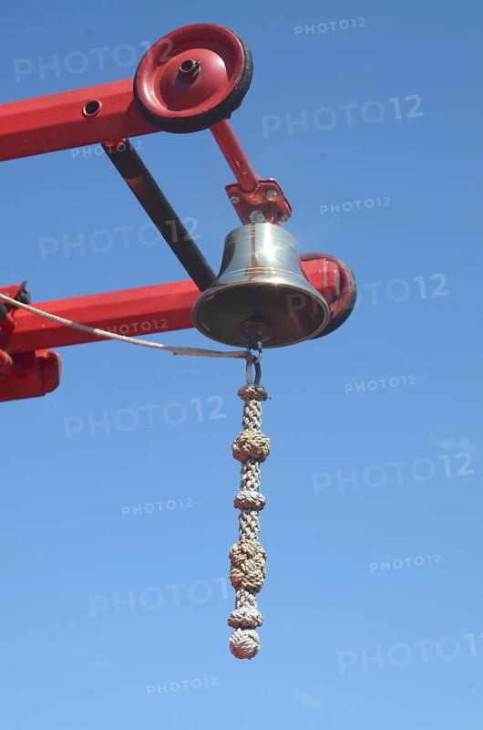 Bell on ladder on veteran fire truck in Ystad, Skåne County, Sweden, Scandinavia