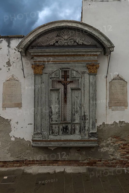Sacred shrine on a house wall, Venice, Veneto, Italy