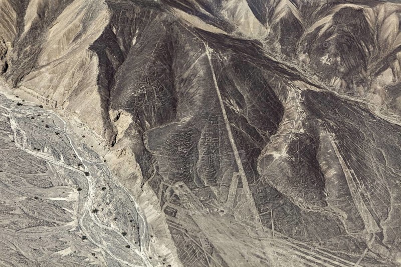 Desert hills with clearly recognizable line patterns and drawn shapes, the geoglyphs and drawings in the desert near Nasca and Palpa in Peru
