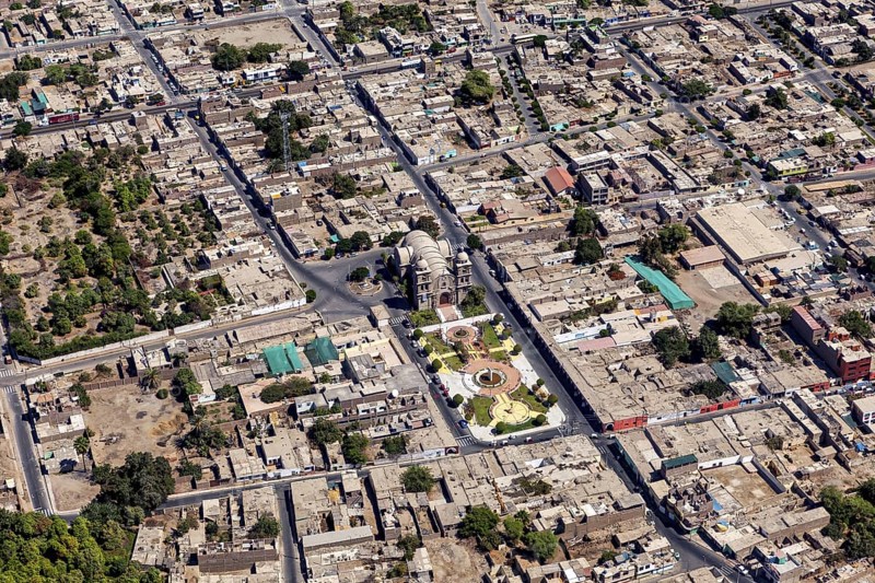 Aerial view of a city with clearly visible roads and buildings, details of urban planning visible, The city of Nasca in Peru
