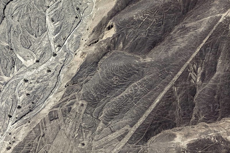 Complex line patterns and elevations in a barren landscape, the geoglyphs and images in the desert near Nasca and Palpa in Peru