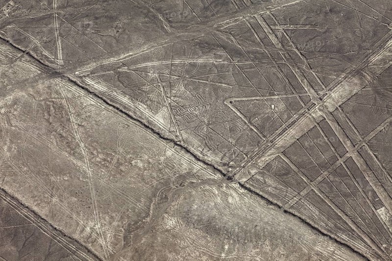 Lines and patterns form on a dry desert surface, the geoglyphs and drawings in the desert near Nasca and Palpa in Peru