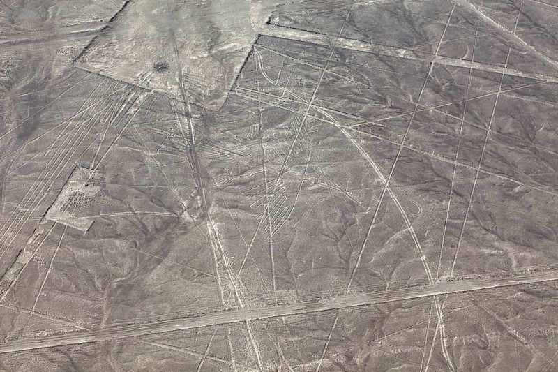 Aerial view of the Nazca lines with visible geometric shapes in the desert, the geoglyphs and images in the desert near Nasca and Palpa in Peru