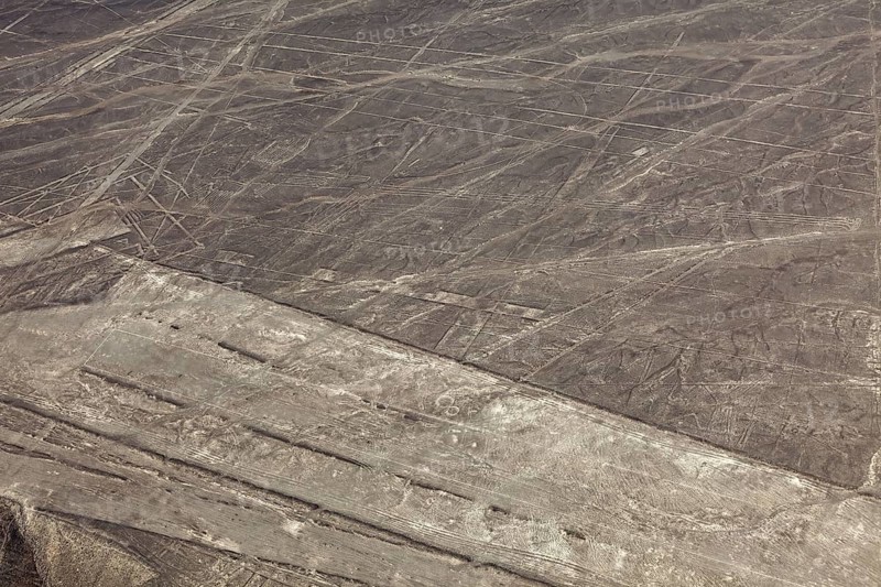 Dry desert area with the Nazca lines and simple geometric patterns, the geoglyphs and drawings in the desert near Nasca and Palpa in Peru